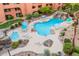 Relaxing community pool and spa with rock waterfall feature at 12212 N Paradise Village S Pkwy # 134, Phoenix, AZ 85032