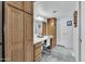 Bathroom with vanity, large mirror, and walk-in shower at 12526 W Paintbrush Dr, Sun City West, AZ 85375