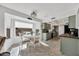 Modern kitchen with light green cabinets and butcher block counter at 12526 W Paintbrush Dr, Sun City West, AZ 85375