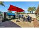 Wonderful patio with painted wall and seating area at 12526 W Paintbrush Dr, Sun City West, AZ 85375