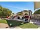 Relaxing patio with covered seating and fire pit at 12526 W Paintbrush Dr, Sun City West, AZ 85375