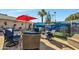 Relaxing patio with painted mural and comfortable seating at 12526 W Paintbrush Dr, Sun City West, AZ 85375