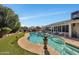 Resort style backyard with a large pool and spa at 12526 W Paintbrush Dr, Sun City West, AZ 85375