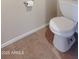 Simple bathroom with a toilet and tile floor at 12618 W Catalina Dr, Avondale, AZ 85392