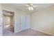 Bedroom with double door closet and carpet at 12618 W Catalina Dr, Avondale, AZ 85392