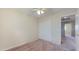 Well-lit bedroom with sliding door closet and carpet at 12618 W Catalina Dr, Avondale, AZ 85392