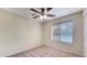 Cozy bedroom with ceiling fan and window blinds at 12618 W Catalina Dr, Avondale, AZ 85392