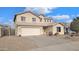 Two-story house with a large yard and a two-car garage at 12618 W Catalina Dr, Avondale, AZ 85392