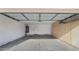 Attached garage with storage cabinets and water heater at 12618 W Catalina Dr, Avondale, AZ 85392