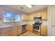 Kitchen features stainless steel appliances and granite countertops at 12618 W Catalina Dr, Avondale, AZ 85392