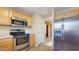 Modern kitchen with stainless steel appliances at 12618 W Catalina Dr, Avondale, AZ 85392