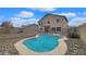 Inviting kidney-shaped pool with a fenced backyard at 12618 W Catalina Dr, Avondale, AZ 85392