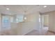 Upstairs hallway with carpet and doors to bedrooms at 12618 W Catalina Dr, Avondale, AZ 85392