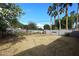 Large backyard with grass, trees, and block wall at 1312 E Coolidge St, Phoenix, AZ 85014