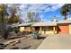 Single story home with landscaped yard at 1312 E Coolidge St, Phoenix, AZ 85014