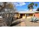 Single story home with landscaped yard at 1312 E Coolidge St, Phoenix, AZ 85014