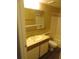 Bathroom with single sink vanity and tub at 1340 N Recker Rd # 243, Mesa, AZ 85205