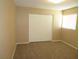 Bedroom with neutral walls and carpet at 1340 N Recker Rd # 243, Mesa, AZ 85205