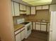 Kitchen with wood cabinets and appliances at 1340 N Recker Rd # 243, Mesa, AZ 85205