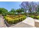 Landscaped park with flowering bushes and gazebo at 13627 N 150Th Ave, Surprise, AZ 85379