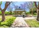 A shaded gazebo with a metal roof in a park setting at 13627 N 150Th Ave, Surprise, AZ 85379