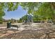 Community playground with playset and seating at 13627 N 150Th Ave, Surprise, AZ 85379