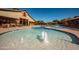 Relaxing pool with water features and lounge chairs at 13627 N 150Th Ave, Surprise, AZ 85379