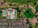 Resort-style pool, spacious deck, and parking area at 13627 N 150Th Ave, Surprise, AZ 85379