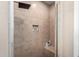 Clean shower with a built-in bench and tiled walls at 13627 N 150Th Ave, Surprise, AZ 85379