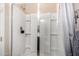 Clean shower with glass enclosure and built-in shelves at 13627 N 150Th Ave, Surprise, AZ 85379