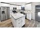 Modern kitchen with white cabinets and large island at 1437 N 44Th St, Phoenix, AZ 85008