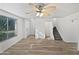 Bright living room with tile floors and a ceiling fan at 1437 N 44Th St, Phoenix, AZ 85008