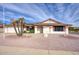 Single-story home with desert landscaping and a two-car garage at 14702 W Buttonwood Dr, Sun City West, AZ 85375