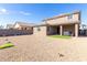 Large backyard with gravel and artificial turf at 18443 W Villa Chula Ln, Surprise, AZ 85387