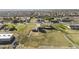 Aerial view of a home on a large lot with surrounding neighborhood at 19320 W Melvin St, Buckeye, AZ 85326