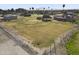 Vast lot with a home and outbuildings; great potential at 19320 W Melvin St, Buckeye, AZ 85326