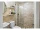 Clean bathroom with shower, toilet and shelving at 19320 W Melvin St, Buckeye, AZ 85326