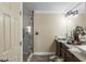 Elegant bathroom with double vanity, granite countertop, and walk-in shower at 19320 W Melvin St, Buckeye, AZ 85326