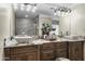 Modern bathroom featuring a double vanity and granite countertop at 19320 W Melvin St, Buckeye, AZ 85326