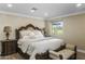 Luxurious main bedroom features a comfortable king-size bed and en-suite bathroom at 19320 W Melvin St, Buckeye, AZ 85326