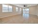 Bright and airy living room with sliding glass doors to patio at 19929 W Roma Ave, Litchfield Park, AZ 85340