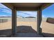 Covered patio providing ample shade and an unobstructed view of the home's private backyard at 24636 W Hopi St, Buckeye, AZ 85326