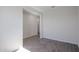 Simple bedroom with tile flooring and neutral color scheme at 24636 W Hopi St, Buckeye, AZ 85326