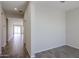 Bright and airy living room showcases stylish tile flooring and fresh paint at 24636 W Hopi St, Buckeye, AZ 85326