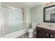 Clean bathroom with a shower/tub combo and dark vanity at 2524 S El Paradiso -- # 106, Mesa, AZ 85202