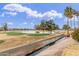 View of a lush green golf course with pond at 2524 S El Paradiso -- # 106, Mesa, AZ 85202