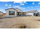 Spacious backyard with gravel landscaping and covered patio at 26330 W Kimberly Way, Buckeye, AZ 85396