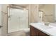 Clean bathroom with single vanity, large shower and toilet at 26330 W Kimberly Way, Buckeye, AZ 85396