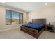 Spacious bedroom with large window and plush bedding at 26330 W Kimberly Way, Buckeye, AZ 85396