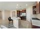 Modern kitchen with a large island and stainless steel appliances at 26330 W Kimberly Way, Buckeye, AZ 85396